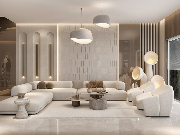 Living room with arched wall niches lit by vertical lights behind a corner sofa