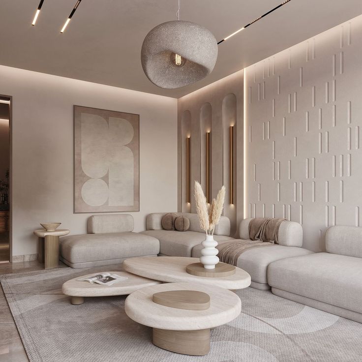 Living room with relief wall panels, arched niches and a lit gypsum cove